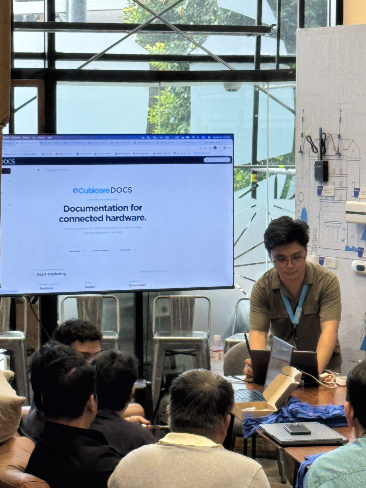 A Cubicore presenter walking participants through the Cubicore documentation