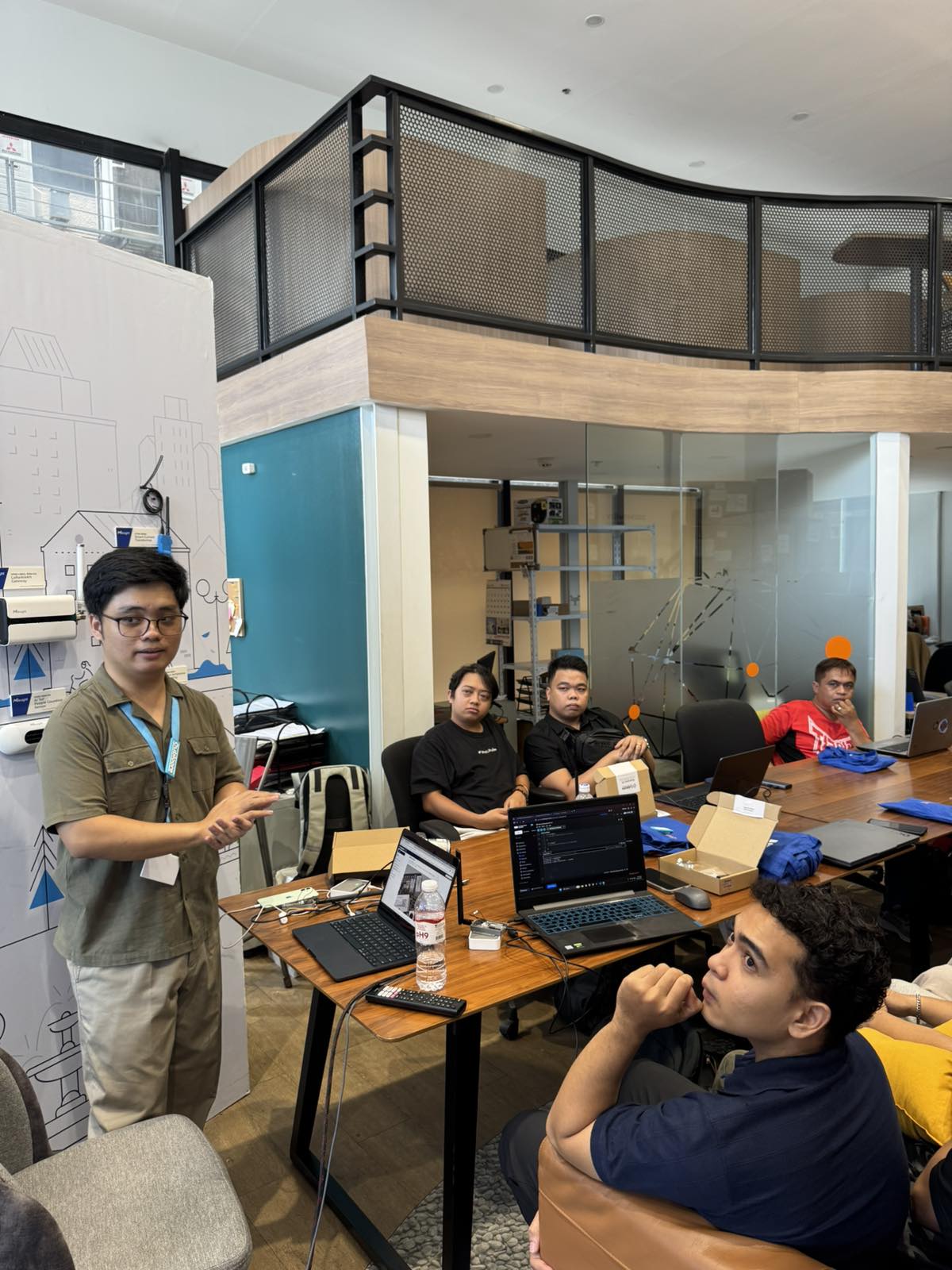 A Cubicore speaker briefing participants at the start of the bootcamp